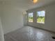 Bedroom filled with natural light and featuring neutral walls and large windows overlooking a scenic view at 2093 Boxwood Se Cir, Conyers, GA 30094