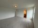 A bright bedroom features neutral walls, natural light, and an ensuite bathroom for added convenience at 2093 Boxwood Se Cir, Conyers, GA 30094