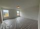 Bright bedroom featuring two large windows with outside views, perfect for relaxation at 2093 Boxwood Se Cir, Conyers, GA 30094