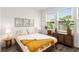 Bright bedroom with large windows, light walls, and minimal decoration creating calm atmosphere at 1265 Wright Se Ln, Atlanta, GA 30316