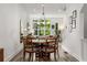 Charming dining room featuring a modern chandelier and large window views at 1265 Wright Se Ln, Atlanta, GA 30316