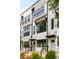 Beautiful townhome row featuring modern design, clean lines, and black framed windows at 1265 Wright Se Ln, Atlanta, GA 30316