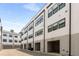 Modern townhome row with private garages and black window frames at 1265 Wright Se Ln, Atlanta, GA 30316