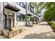 Townhome exteriors featuring covered entryways and modern railings, creating an inviting street appeal at 1265 Wright Se Ln, Atlanta, GA 30316