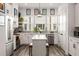 Stylish kitchen featuring modern cabinetry, center island, and bright windows, perfect for cooking and entertaining at 1265 Wright Se Ln, Atlanta, GA 30316