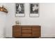 Stylish buffet with decor and modern art for an elegant and curated look at 1265 Wright Se Ln, Atlanta, GA 30316