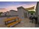 Spacious rooftop deck area with dining and grilling spaces and a shade awning at 1265 Wright Se Ln, Atlanta, GA 30316