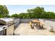 Rooftop deck features a grill and picnic table, perfect for outdoor entertaining at 1265 Wright Se Ln, Atlanta, GA 30316