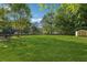 Large backyard with shed, ideal for outdoor activities and relaxation at 161 Brookfield Dr, Stockbridge, GA 30281