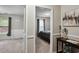 Bedroom view, showing connecting spaces, neutral walls, window, carpet flooring and natural light at 161 Brookfield Dr, Stockbridge, GA 30281