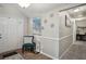 Bright entryway with a decorative chair, artwork, and welcoming decor creating a stylish ambiance at 161 Brookfield Dr, Stockbridge, GA 30281