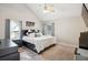 Spacious main bedroom with vaulted ceiling, ample natural light, carpet floors and a ceiling fan at 161 Brookfield Dr, Stockbridge, GA 30281