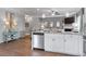Well-designed kitchen flowing into the living room, featuring modern appliances and an island at 210 Bastian Dr # 109, Villa Rica, GA 30180