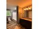 Bathroom with granite countertops, updated fixtures, and a shower/bath at 2674 Skylane Dr, Marietta, GA 30062