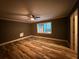 Bedroom featuring hardwood floors and large windows with natural light at 2674 Skylane Dr, Marietta, GA 30062