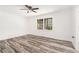 Bright, spacious bedroom featuring hardwood floors and a large window at 2674 Skylane Dr, Marietta, GA 30062