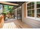 Inviting covered porch offers a relaxing outdoor seating area at 2674 Skylane Dr, Marietta, GA 30062