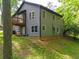 Exterior rear view showing a deck and lawn at 2674 Skylane Dr, Marietta, GA 30062