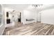 Spacious open-concept living room with wood floors and modern decor at 2674 Skylane Dr, Marietta, GA 30062