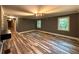 Spacious living room featuring hardwood floors and large windows with natural light at 2674 Skylane Dr, Marietta, GA 30062