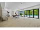 Spacious basement features a pool table, bar, and large windows offering a view of the pool at 292 Highway 279, Fayetteville, GA 30214