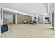 Large basement offers a seating area, pool table, and modern design elements at 292 Highway 279, Fayetteville, GA 30214