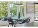 Dining area featuring a modern light fixture and views of the surrounding trees at 292 Highway 279, Fayetteville, GA 30214