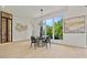 Bright dining area with floor-to-ceiling windows and contemporary decor at 292 Highway 279, Fayetteville, GA 30214