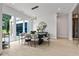 Bright dining room featuring modern table and chairs, stylish light fixture, and lots of natural light at 292 Highway 279, Fayetteville, GA 30214