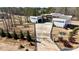 Stunning modern home featuring a long driveway, meticulously landscaped yard and a sleek three car garage at 292 Highway 279, Fayetteville, GA 30214