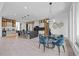 Open concept kitchen with a large island, bar seating, and modern light fixtures at 292 Highway 279, Fayetteville, GA 30214