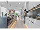 Modern kitchen featuring a spacious island, sleek countertops, and integrated appliances at 292 Highway 279, Fayetteville, GA 30214