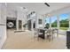 Open-concept living space with a modern dining area, stylish decor, and lots of natural light at 292 Highway 279, Fayetteville, GA 30214