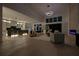 Spacious living area with a modern fireplace, open floor plan, and large windows at 292 Highway 279, Fayetteville, GA 30214