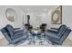 Modern sitting room with distinctive chairs and ample natural light at 292 Highway 279, Fayetteville, GA 30214