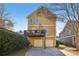 Rear of home with 2-car garage, and private deck at 976 Arthur Nw Ln, Atlanta, GA 30318