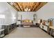 Spacious finished basement with open ceiling, play area, and ample lighting at 976 Arthur Nw Ln, Atlanta, GA 30318