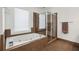 Modern bathroom features a soaking tub with tile surround and a glass-enclosed shower at 976 Arthur Nw Ln, Atlanta, GA 30318