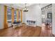 Elegant dining room with hardwood floors, large windows, and stylish lighting, perfect for formal gatherings at 976 Arthur Nw Ln, Atlanta, GA 30318