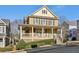 Charming two-story home features a welcoming front porch, well-maintained landscaping, and classic architectural details at 976 Arthur Nw Ln, Atlanta, GA 30318