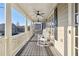 Relaxing covered porch with rocking chairs and ceiling fans to enjoy the view at 976 Arthur Nw Ln, Atlanta, GA 30318