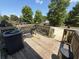 Cozy outdoor deck featuring weathered wood, trees, and a grill, perfect for entertaining or relaxing at 229 Odyssey Turn, Conyers, GA 30012