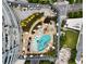 Aerial view showcasing the building's rooftop pool, seating, and stunning landscaping, creating a luxurious outdoor space at 3344 Peachtree Ne Rd # 3005, Atlanta, GA 30326