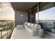 Relaxing balcony area featuring comfortable seating and city views from this luxury condo at 3344 Peachtree Ne Rd # 3005, Atlanta, GA 30326