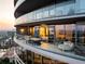Outdoor condo balcony with city views, dining set, and cozy seating area at 3344 Peachtree Ne Rd # 3005, Atlanta, GA 30326