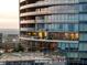 Exterior of high-rise condo building with balconies and city views at sunset at 3344 Peachtree Ne Rd # 3005, Atlanta, GA 30326