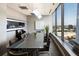 Bright conference room with floor-to-ceiling windows, large table, and views of the city skyline at 3344 Peachtree Ne Rd # 3005, Atlanta, GA 30326