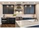 Gourmet kitchen featuring marble countertops, custom cabinetry, and professional-grade stainless steel appliances at 3344 Peachtree Ne Rd # 3005, Atlanta, GA 30326