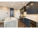 Modern kitchen features stainless steel appliances, sleek cabinetry, and marble countertops at 3344 Peachtree Ne Rd # 3005, Atlanta, GA 30326