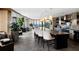 Stylish kitchenette and lounge area with a bar-height counter, stools, and a seating area with cityscape views at 3344 Peachtree Ne Rd # 3005, Atlanta, GA 30326